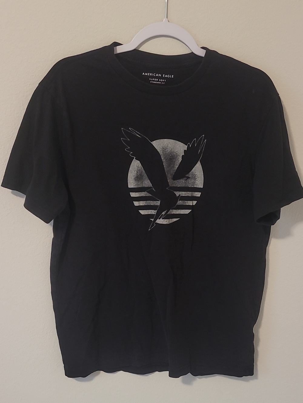 American Eagle Outfitters Black Tee with Silver Bird Graphic